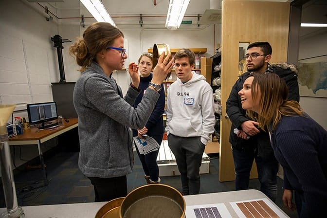 Open house guests shown lab equipment