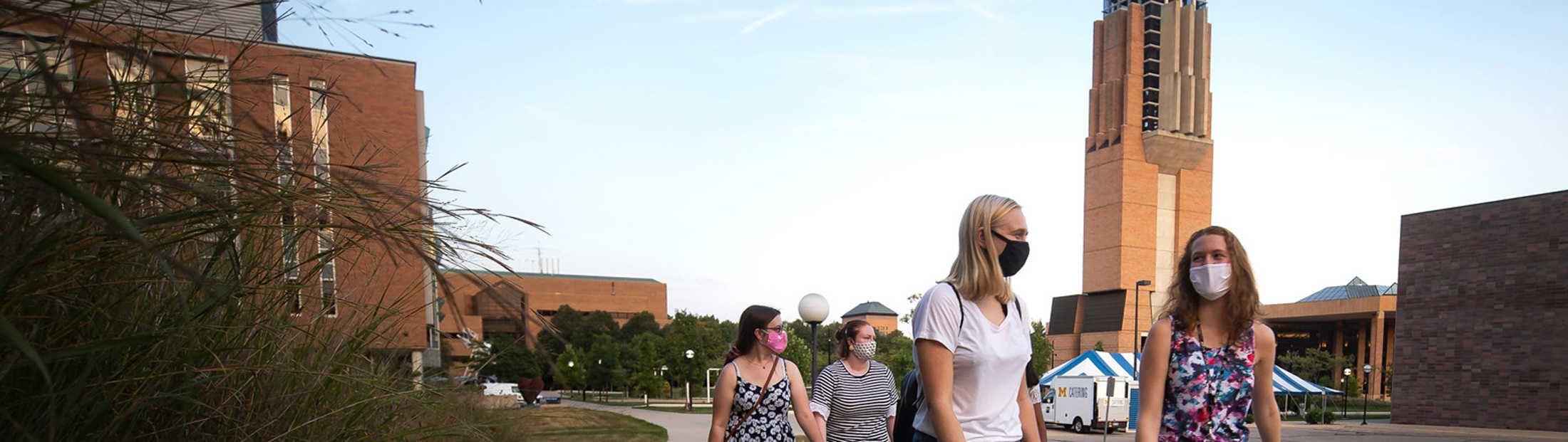 A group of Women in Science and Engineering (WISE) program members hang out on the Eda U. Gerstacker Grove on North Campus. Photo: Joseph Xu/Michigan Engineering