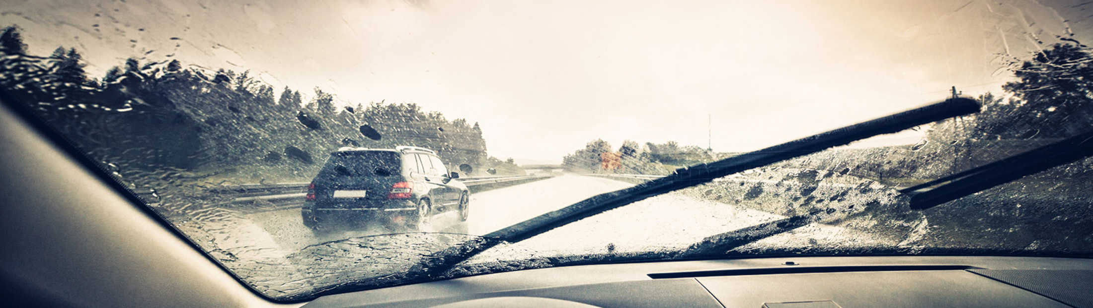 Car driving in the rain